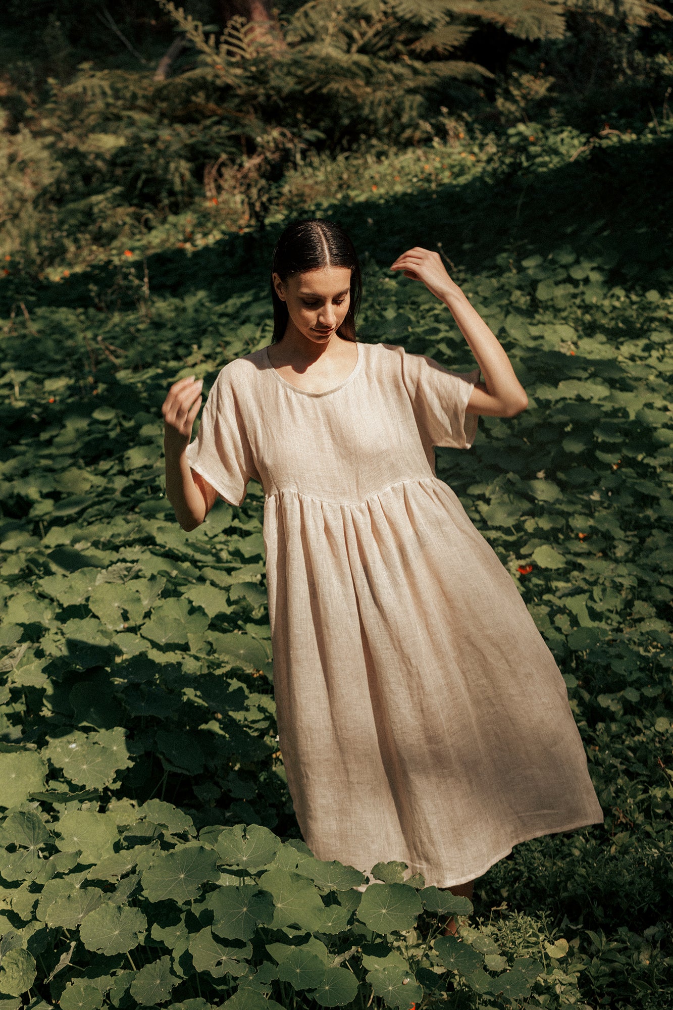 Model wearing Museā Forest dress made in 100% linen.