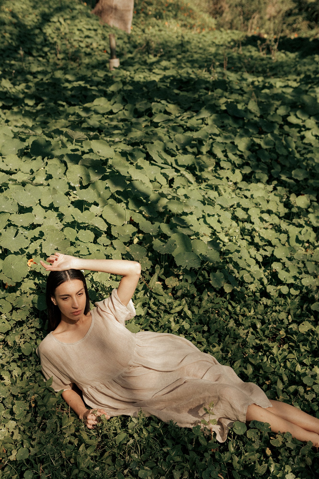 Model wearing Museā Forest dress made in 100% linen.