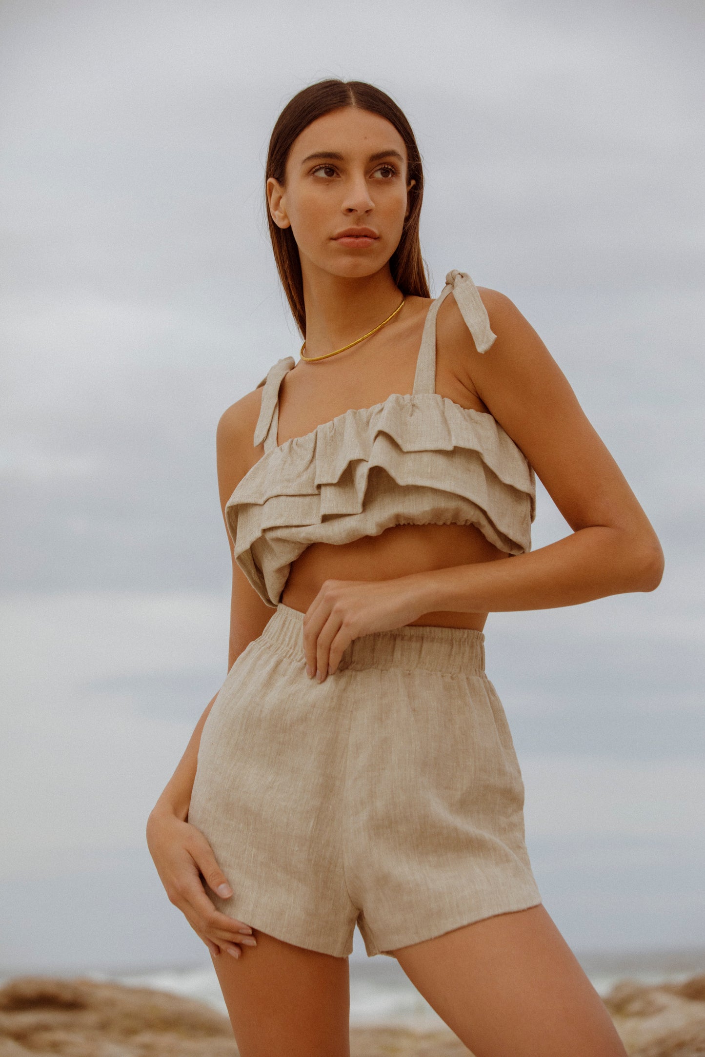 Model wearing top and shorts