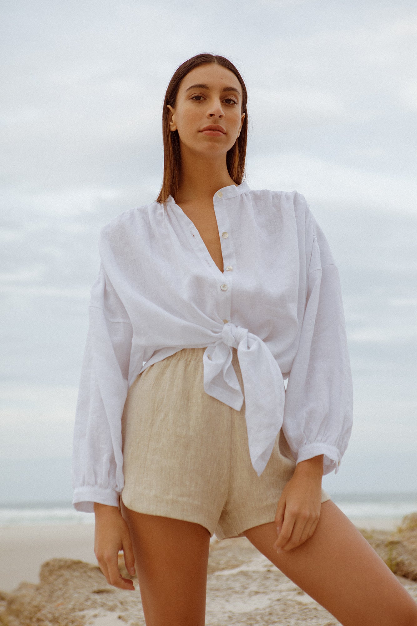model wearing white linen Bartolomeu shirt