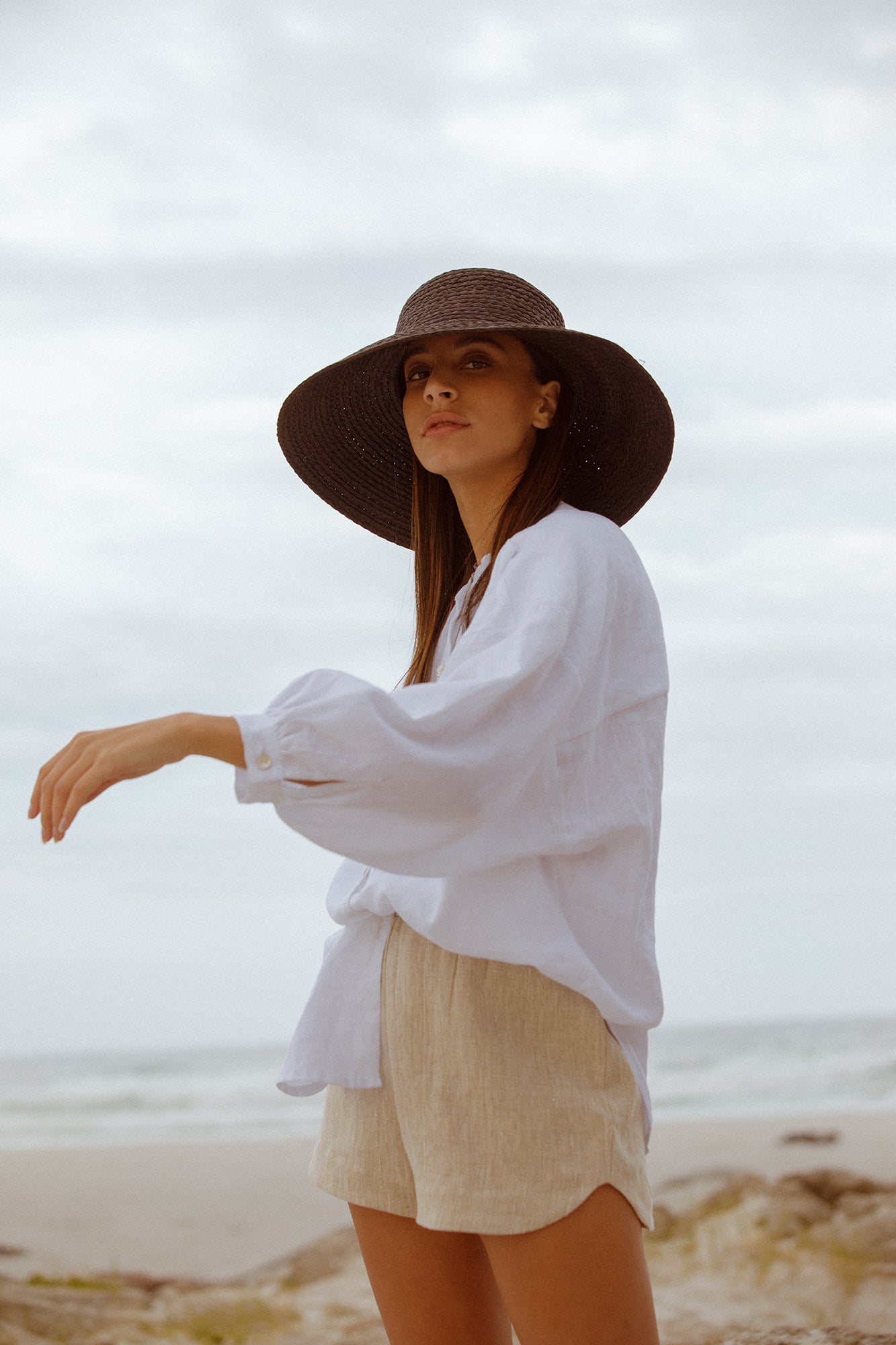 model wearing white linen Bartolomeu shirt