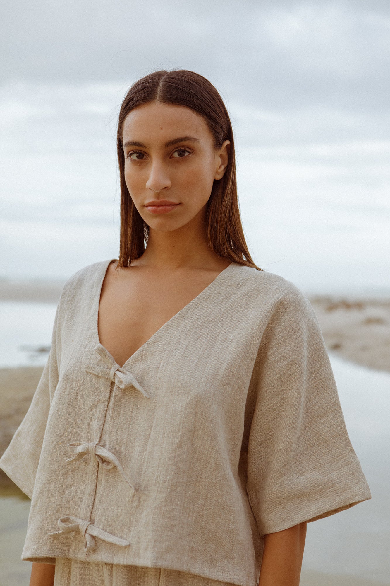 model wearing native pure linen top