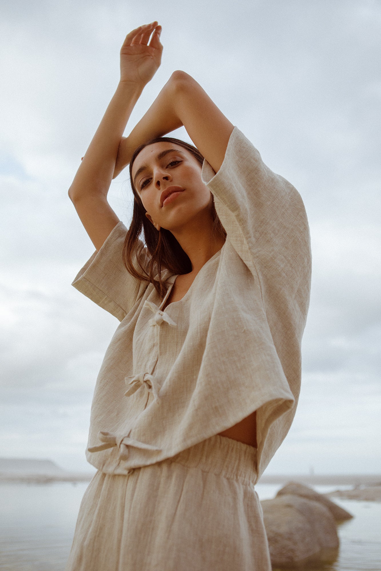 model wearing pure linen native top