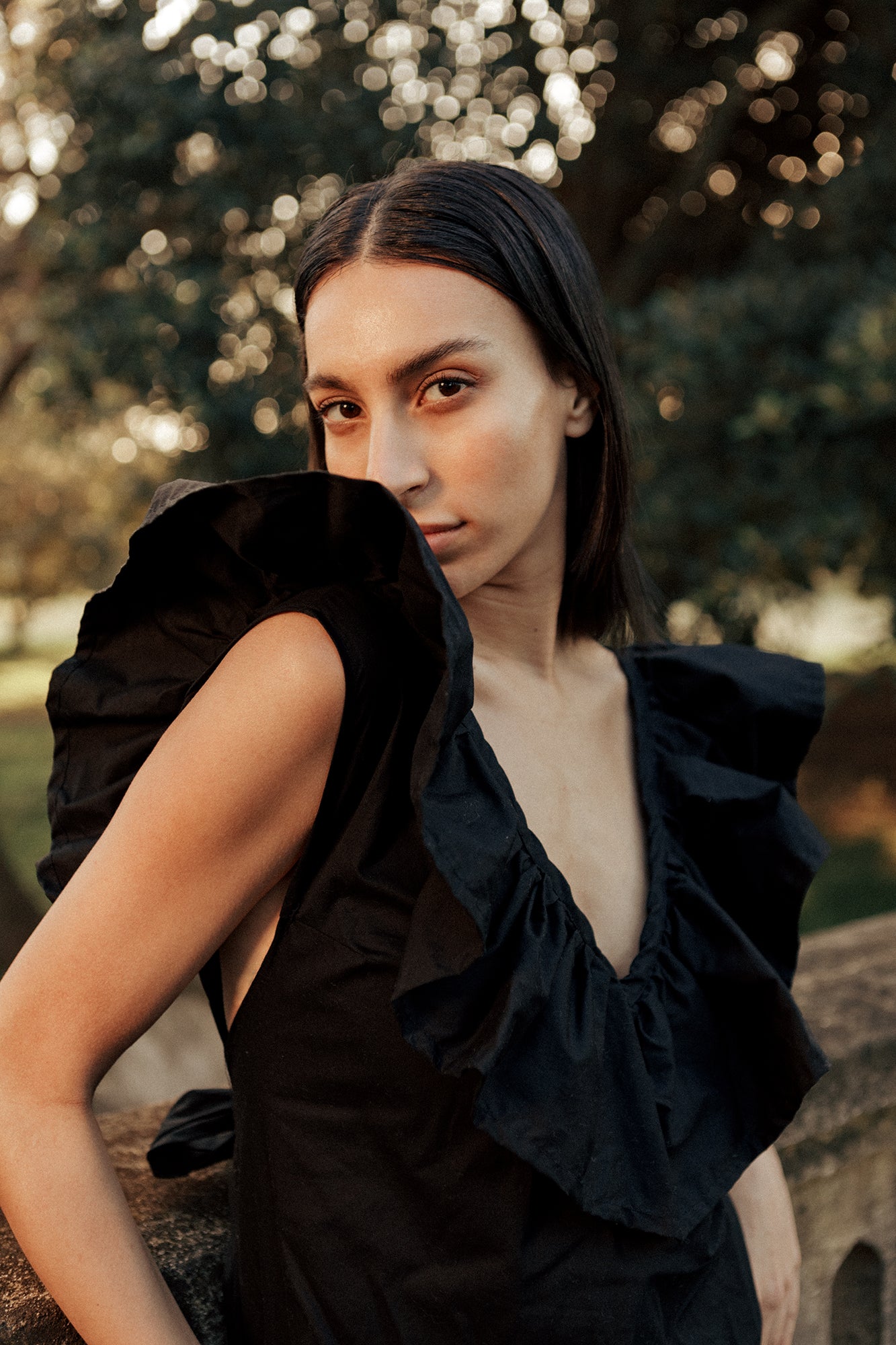 Model wearing Museā black long Poppy Dress in cotton