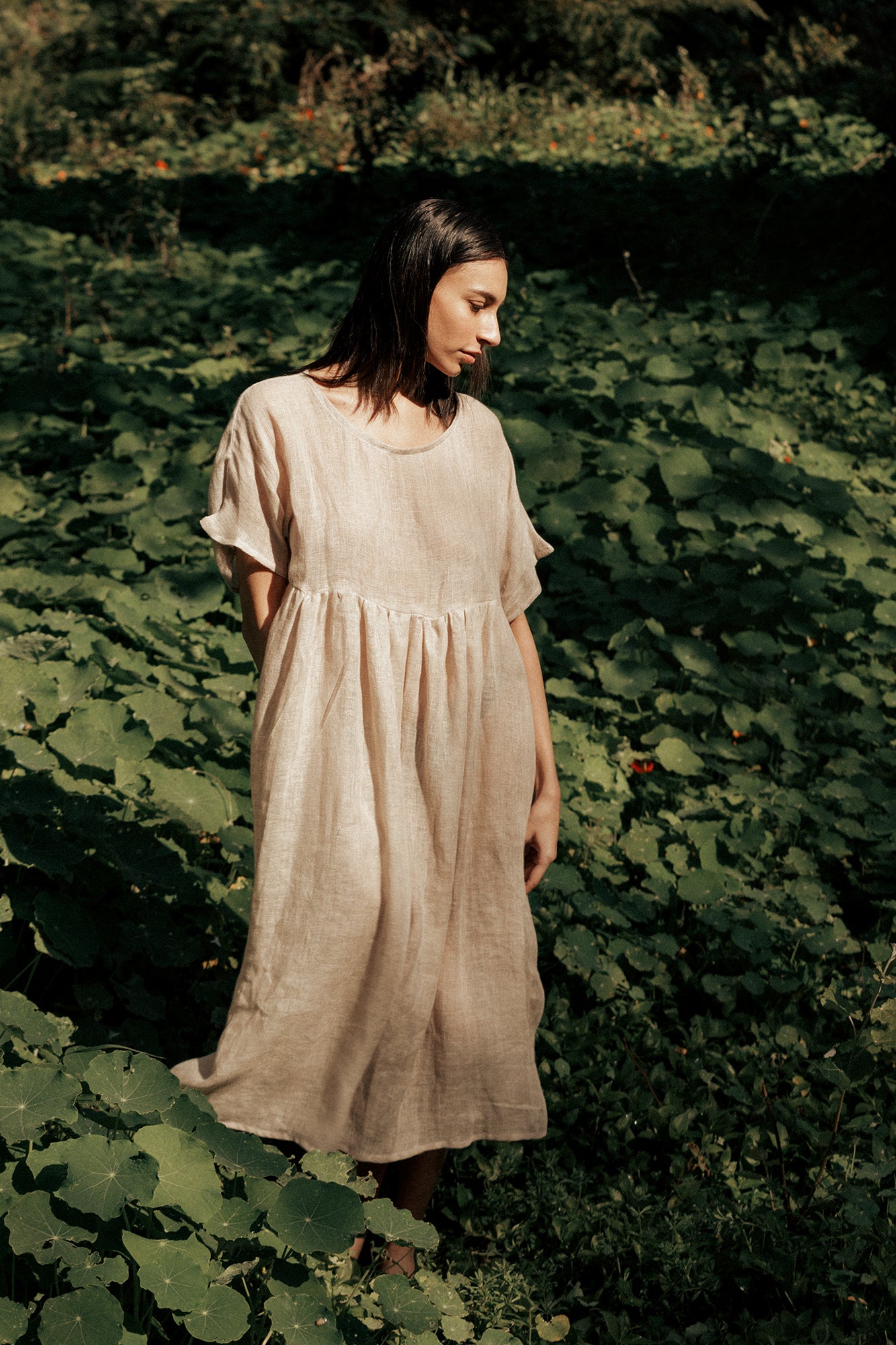 Model wearing Museā Forest dress made in 100% linen.
