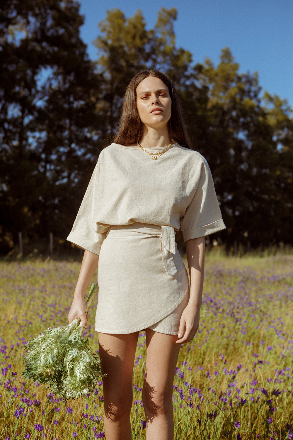 Model in wrap skirt